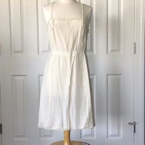 New York, Little Joe, Gail Elliot. Cream spaghetti strap dress.